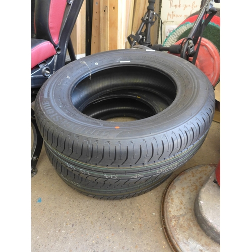 2377 - Two unused Bridgestone 195/65/R15 tyres