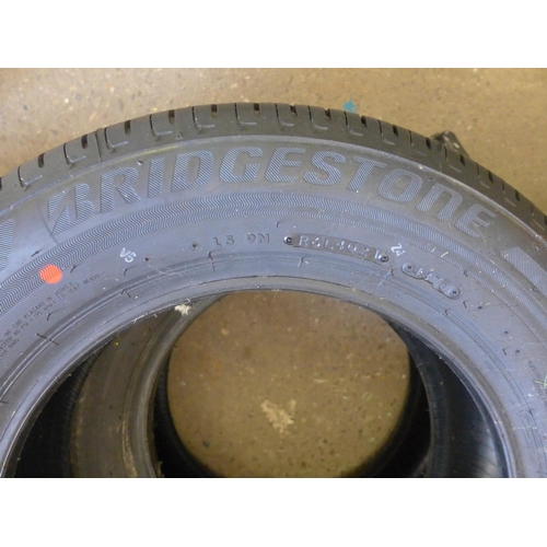 2377 - Two unused Bridgestone 195/65/R15 tyres