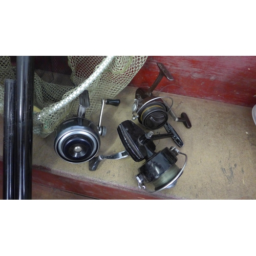 2227 - Abu, Daiwa and New Deluxe fishing reels, rod rest, floats, landing net and tray in lureflash carry b... 