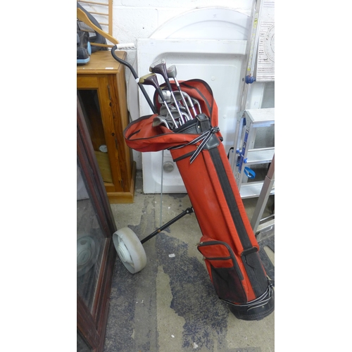 2278 - Full set of golf clubs in Letters trolley