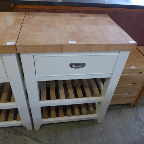 1996 - A white painted small kitchen island unit with a beech top