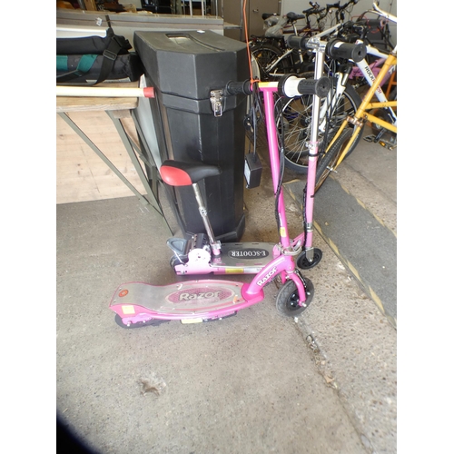 2147 - An E-scooter with charger and Razor electric scooter (Police Repossession)