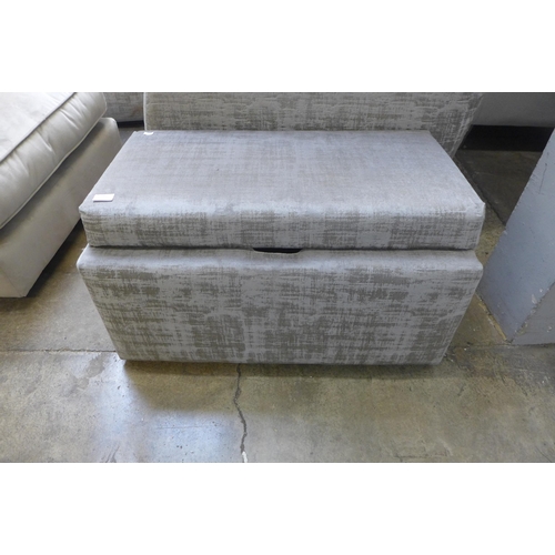 1559 - A Vincent Alessia silver rectangular ottoman footstool