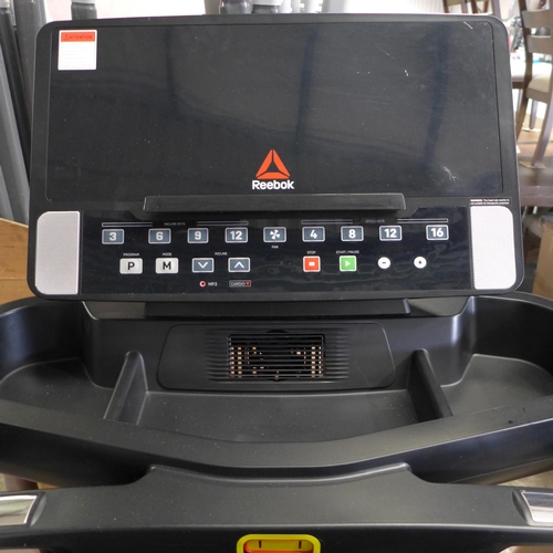 3121 - Reebok Astroride A6.0 treadmill - (Box of Accessories Behind Counter)