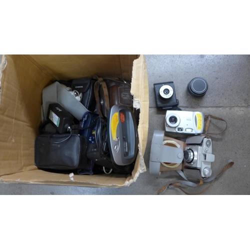 1162 - A box of cameras and camera equipment including zooms and lenses **PLEASE NOTE THIS LOT IS NOT ELIGI... 