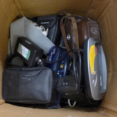 1162 - A box of cameras and camera equipment including zooms and lenses **PLEASE NOTE THIS LOT IS NOT ELIGI... 