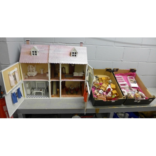 1164 - A dolls house and a quantity of furniture and accessories **PLEASE NOTE THIS LOT IS NOT ELIGIBLE FOR... 