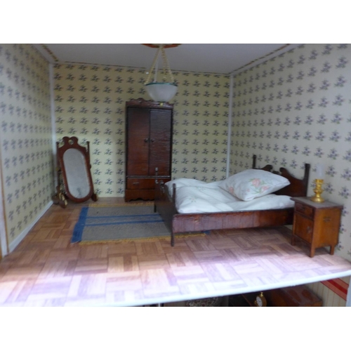 1164 - A dolls house and a quantity of furniture and accessories **PLEASE NOTE THIS LOT IS NOT ELIGIBLE FOR... 