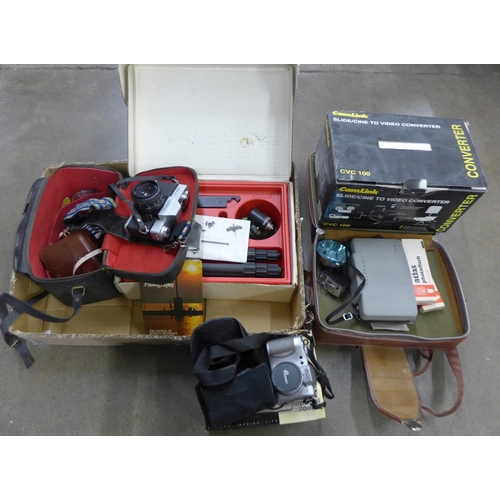 1165 - A box containing various camera equipment including a slide to video converter **PLEASE NOTE THIS LO... 