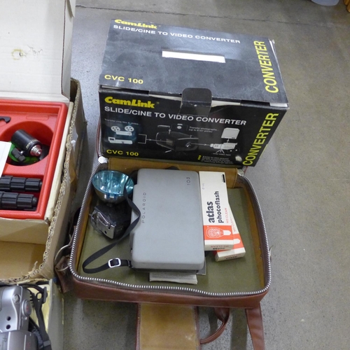 1165 - A box containing various camera equipment including a slide to video converter **PLEASE NOTE THIS LO... 