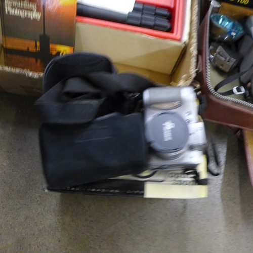 1165 - A box containing various camera equipment including a slide to video converter **PLEASE NOTE THIS LO... 