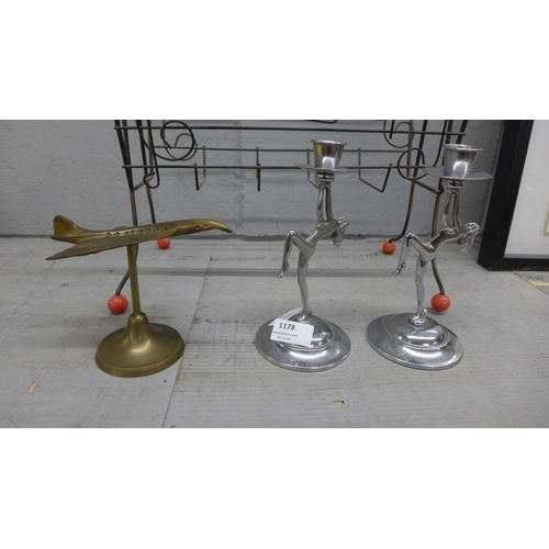 1178 - A pair of chrome candlesticks, a model Concorde and a magazine rack **PLEASE NOTE THIS LOT IS NOT EL... 