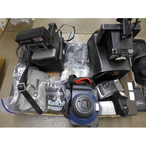 1194 - A box of cameras including Polaroid, Nikon and Kodak **PLEASE NOTE THIS LOT IS NOT ELIGIBLE FOR POST... 