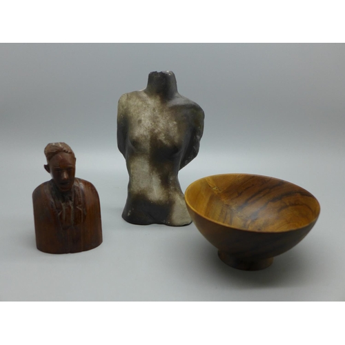 675 - A small carved bust, J. Hall 1944, a carved wooden bowl and a sculpture