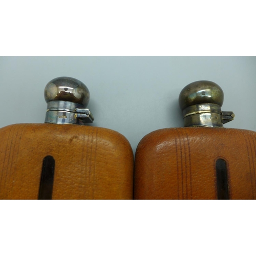 680 - Two leather covered hip flasks with plated tops