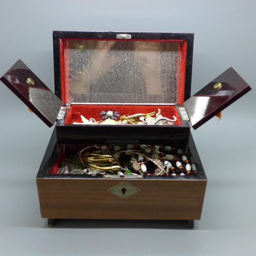 700 - A jewellery box and costume jewellery