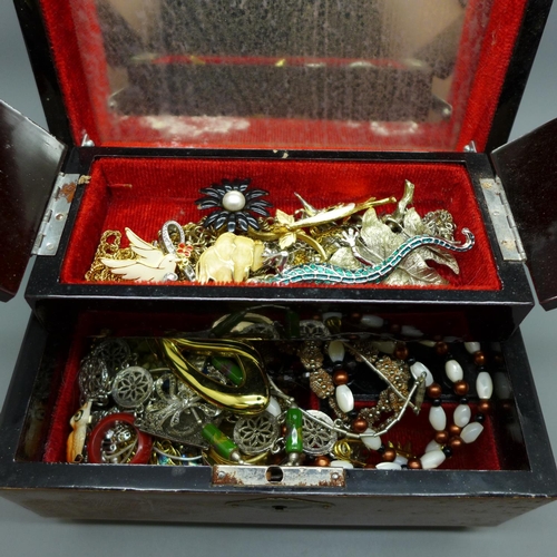 700 - A jewellery box and costume jewellery