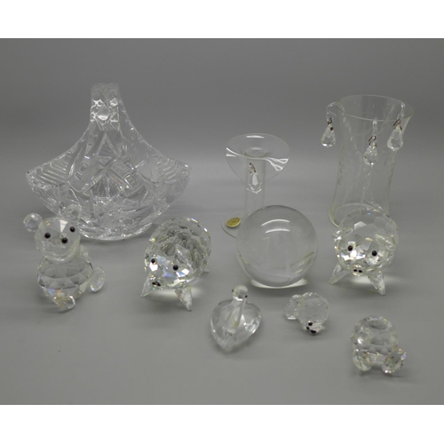 702 - A collection of Swarovski crystal figures, a/f, and four other items of glass