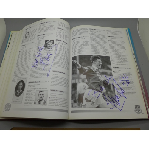 714 - West Ham United; A Who's Who, Player by Player book containing approximately 86 signatures from form... 