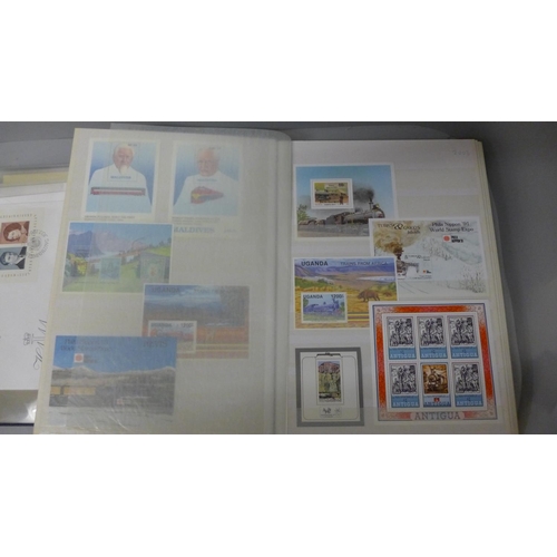 726 - Stamps; miniature sheets in 48 page stockbook and on cover in album