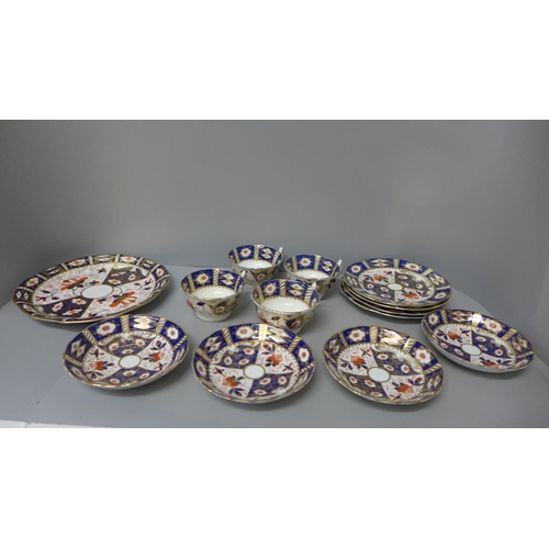 734 - Four Imari trios and a sandwich plate, one saucer a/f