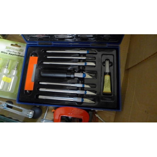 736C - A box of mixed model making tools and equipment, tweezers, pliers, a table vice, small G-clamps, a b... 