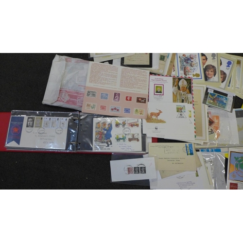 748 - Stamps; box of stamp albums, covers, presentation packs, etc.