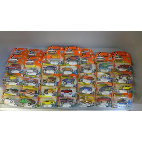 795 - Sixty-six Matchbox Hero-City model vehicles in blister packs