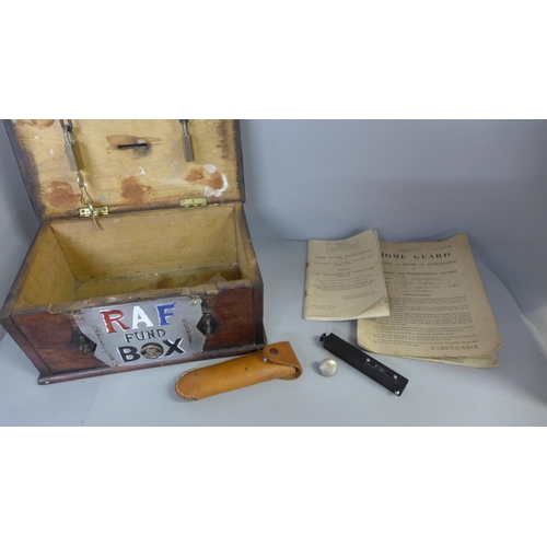 811 - A Home Guard wooden box with applied badges, two booklets and a military Hilgar and watch range find... 