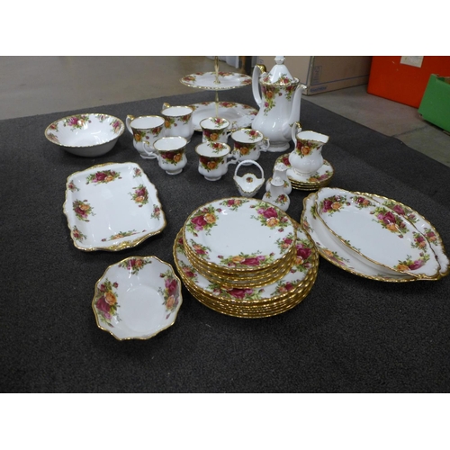 831 - A Royal Albert Old Country Roses part coffee set, a three tier cakestand, tea plates, side plates, e... 