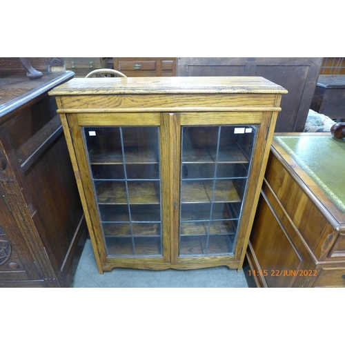 103 - An oak two door bookcase