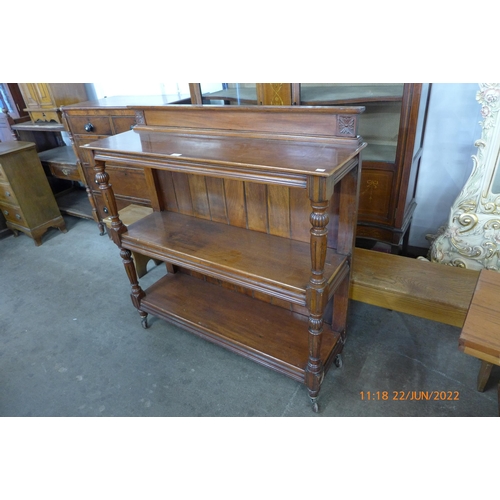 109 - A Victorian mahogany three tier buffet