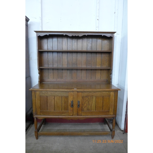 111 - An Arts and Crafts oak dresser