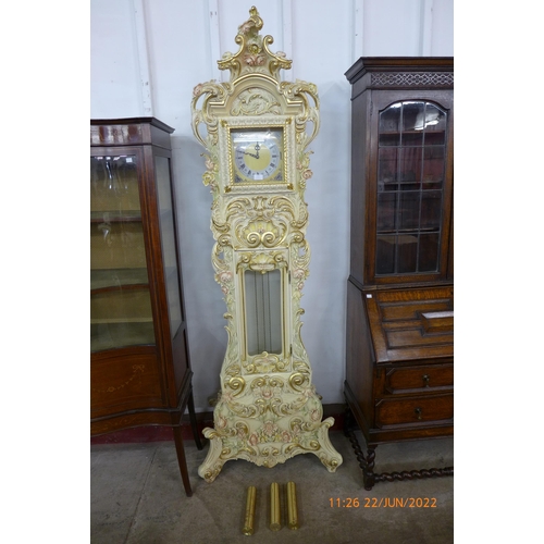 113 - An Italian cream and parcel gilt quartz longcase clock