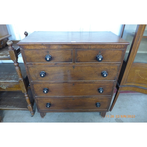 115 - A Victorian walnut chest of drawers