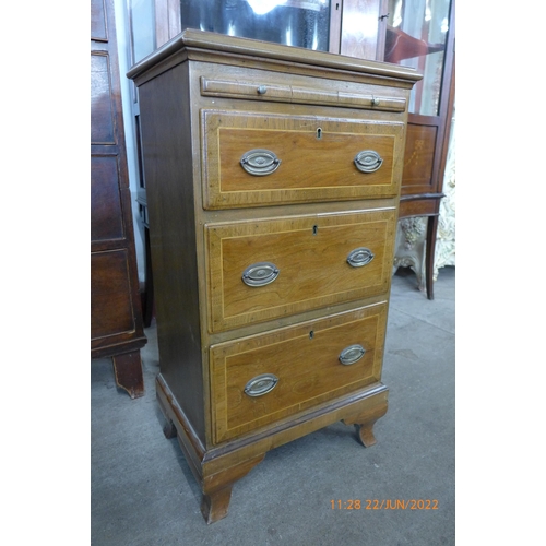 119 - A small George III style mahogany bachelor's chest of drawers