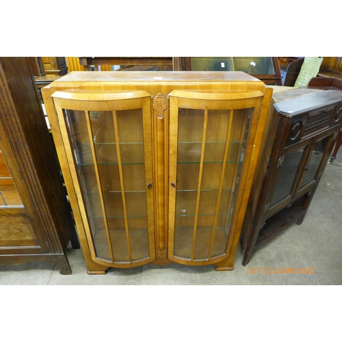 179 - A walnut two door display cabinet