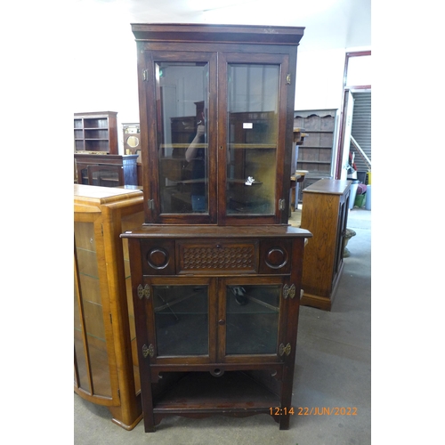 180 - An Edward VII mahogany freestanding corner cabinet