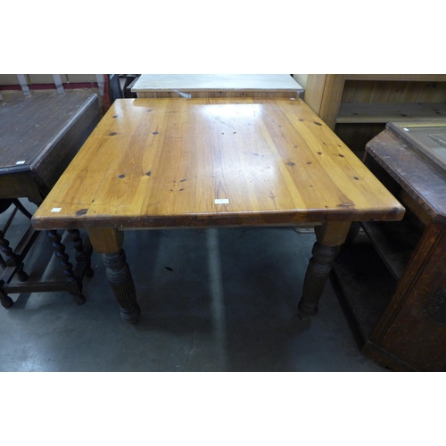 248 - A Victorian waxed pine and beech kitchen table