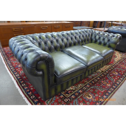 6 - A green leather Chesterfield settee