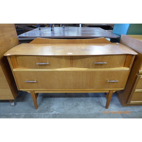 87 - A small teak sideboard