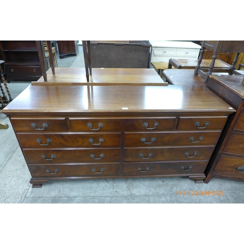 96 - A George III style mahogany chest of drawers