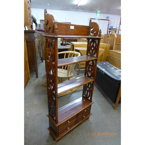 97 - A Chippendale style mahogany open bookcase