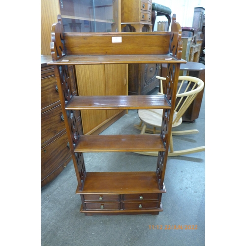 97 - A Chippendale style mahogany open bookcase