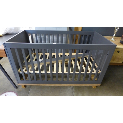 1695 - A grey painted cot bed * this lot is subject to VAT - damaged leg