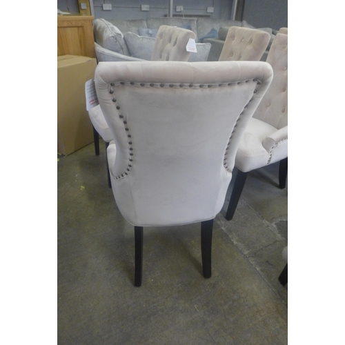 1576 - A set of six dusky pink upholstered dining chairs with black legs