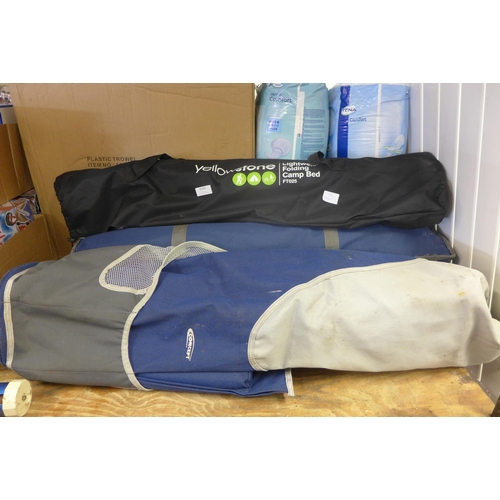 2102 - Three folding camp beds in carry cases