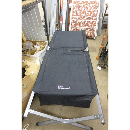 2102 - Three folding camp beds in carry cases