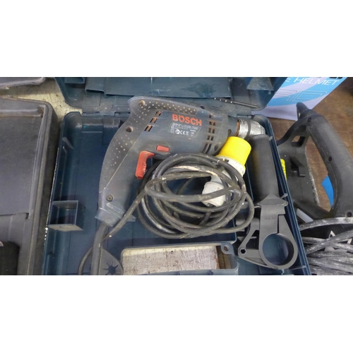 2125 - A Bosch 110v GB13E Professional drill, Macallister cordless drill and a Titan sander