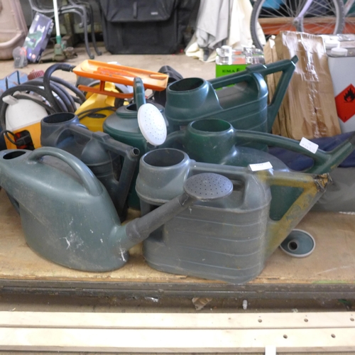 2164 - 5 Plastic watering cans